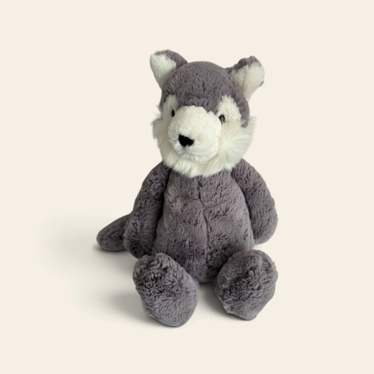 Bashful Wolf BAS3W: a grey plush wolf with a cream face and pointed ears, sitting