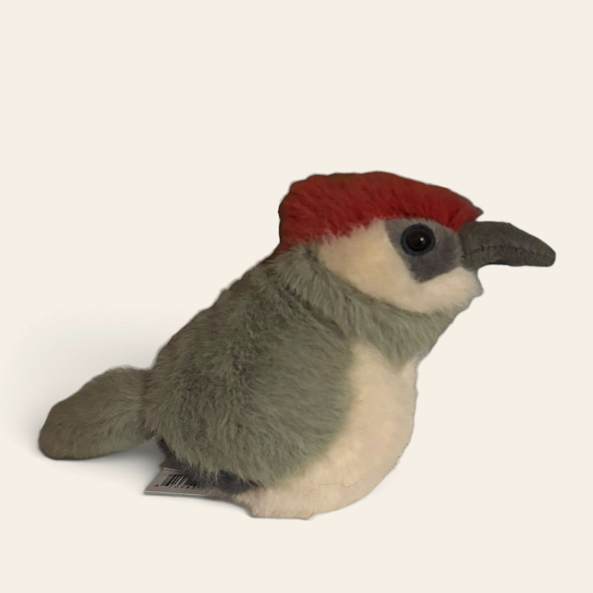 Birdling Woodpecker BIR6WO: a small plush woodpecker with a red cap, a pale peach face and chest, olive green wings and tail and a grey beak