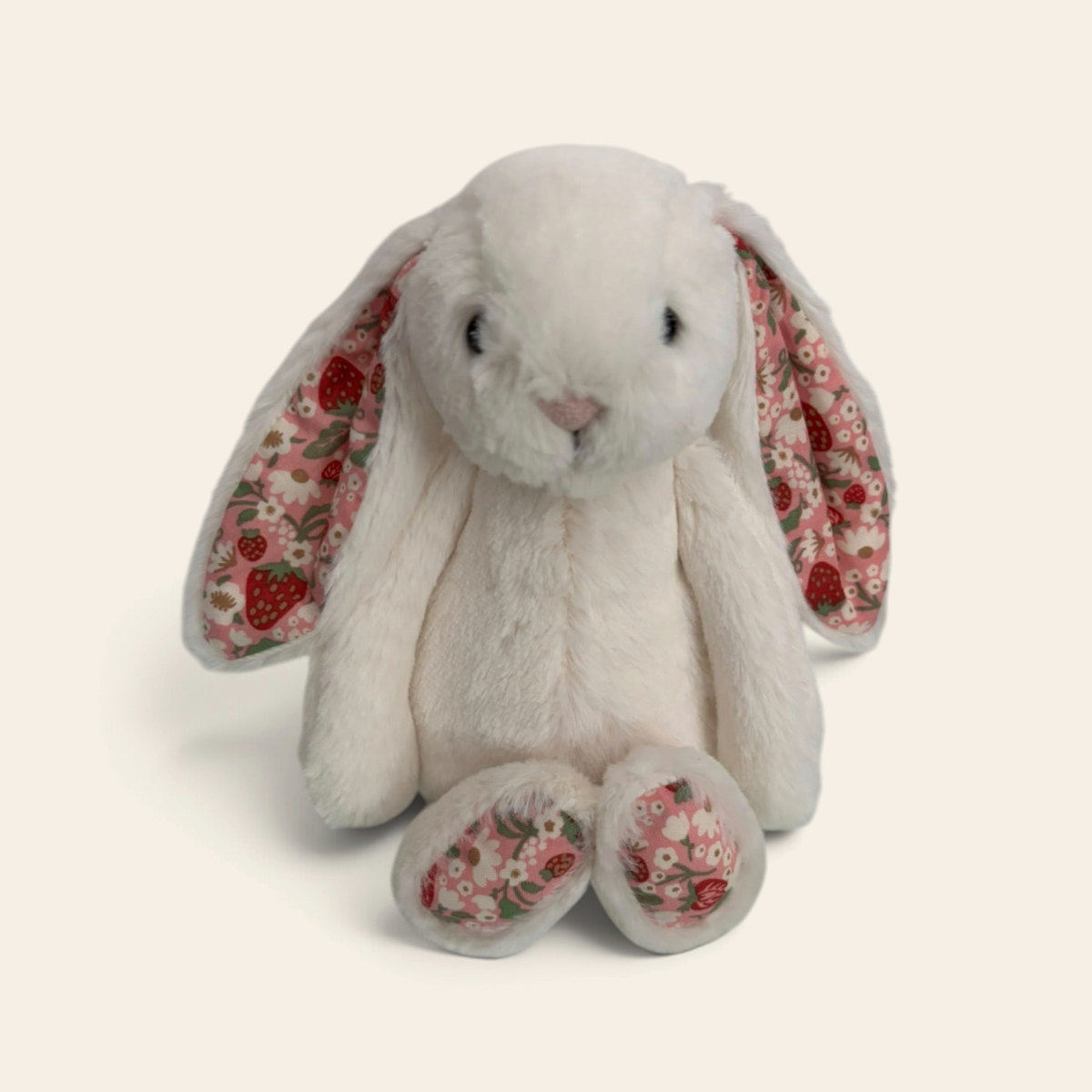Blossom Cream Bunny 'Berry' BMP3MS: a cream plush bunny with pink berry print inner ears and feet, sitting