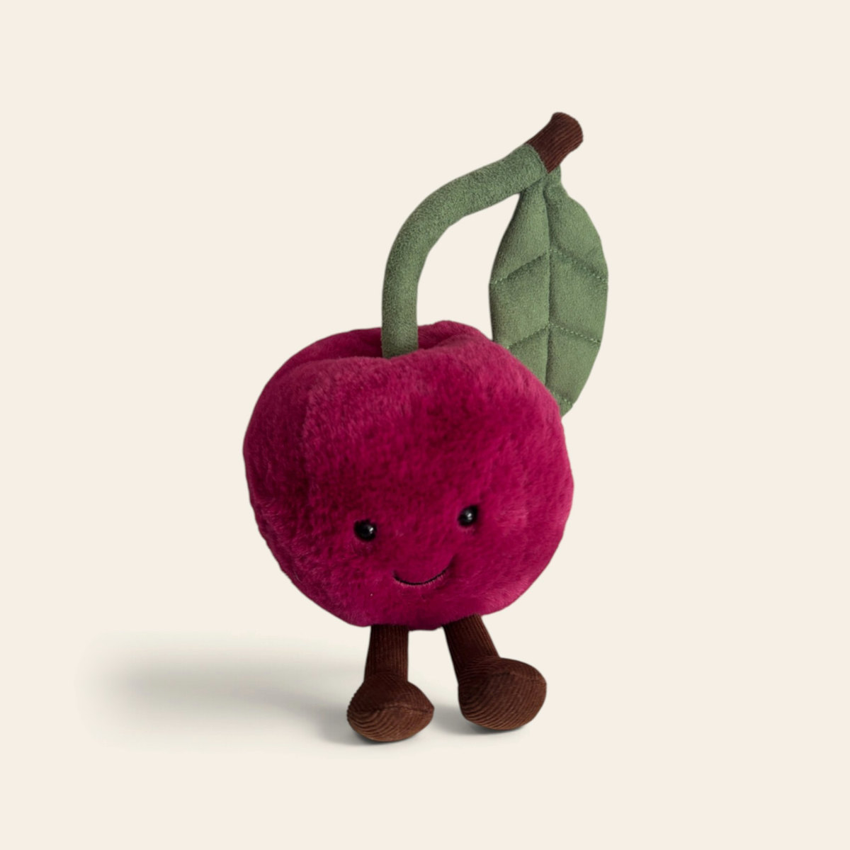 Amuseables Cherry A6CHR: a deep red plush cherry toy with a green stalk and leaf, a smiling face and brown corduroy legs