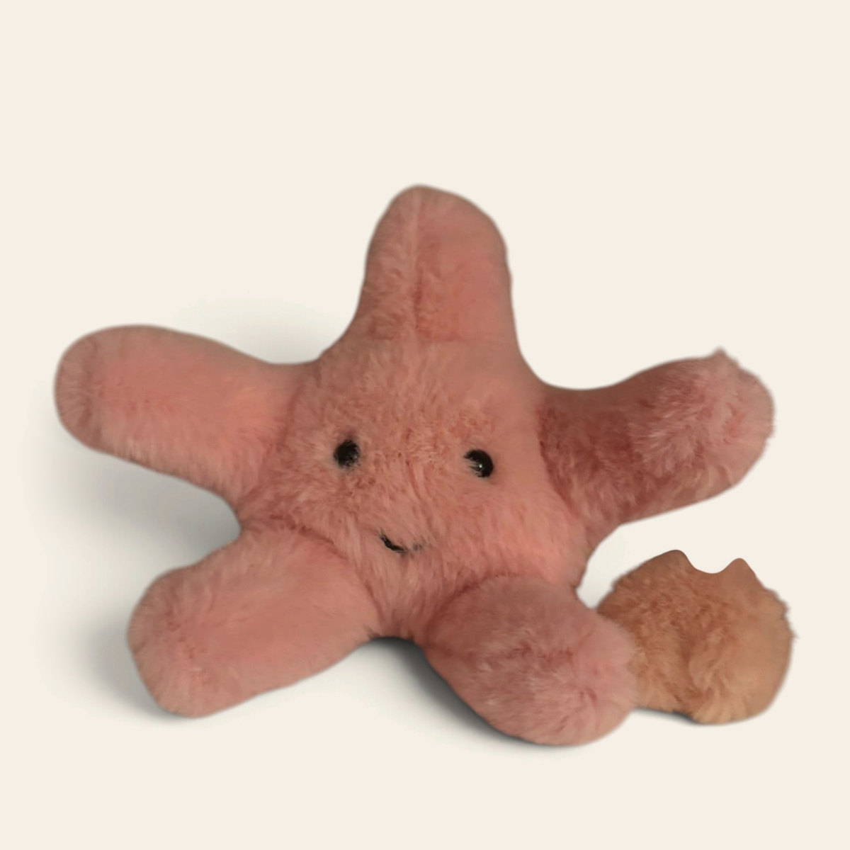 Fluffy Starfish F6SF: a coral pink fluffy plush starfish with a smiling face