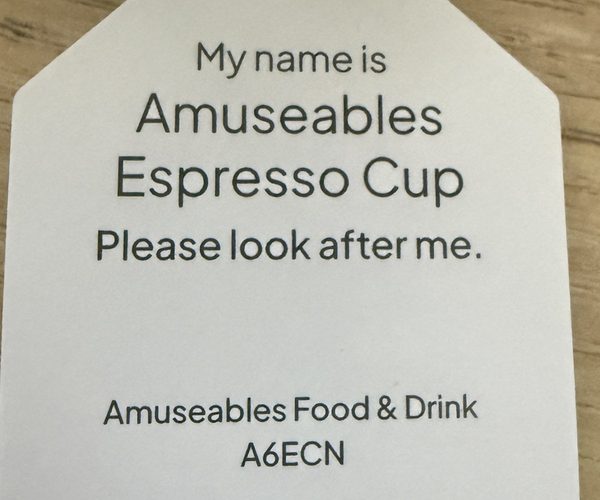 Paper swing tag reading Amuseables Espresso Cup, with the product code A6ECN printed on the bottom line